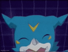 a close up of a blue cartoon character with a yellow arrow on his head .