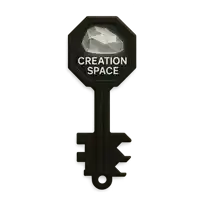 a black key with the words creation space written on it