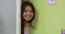 a woman is standing in a doorway and says " good night "