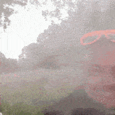 a man wearing sunglasses stands in a field