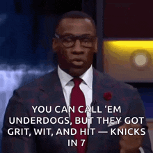 a man in a suit and tie is saying you can call ' em underdogs