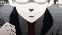 a close up of a man 's face with glasses and a red tie
