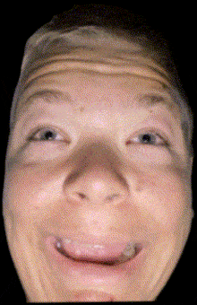 a close up of a person 's face with a funny face