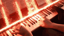 Playing Piano With Feet Toms Mucenieks GIF - Playing Piano With Feet Toms Mucenieks Playing Piano GIFs