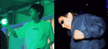 a man in a white shirt and a man in a blue jacket are dancing in a dark room .