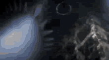 a blurry picture of a person 's face in the dark with a circle in the middle .