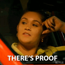 a woman in a car says there 's proof on the screen