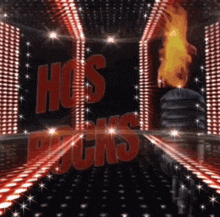 a stage with a microphone and the words hogs rocks on it