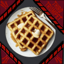 two waffles with syrup and butter on a plate with a fork in front of a sign that says trumpet