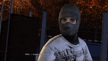 a man with a beard is talking to a man in a mask