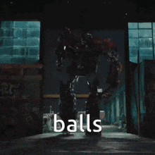 a man is holding a bat and the word balls is visible