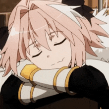 a girl with pink hair is sleeping with her eyes closed on a table .