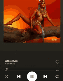 a thumbs up icon is on the screen of a music player for the song woman by doja cat
