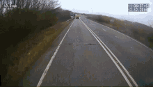 a picture of a highway with a time of 11:36 37 53