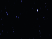 a cartoon drawing of a space ship with yellow rays coming from it