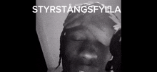 a black and white photo of a man with the words styrstangsfylla on the top