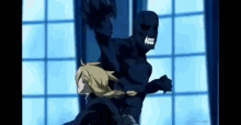 a man in a black suit is holding a woman in his arms .