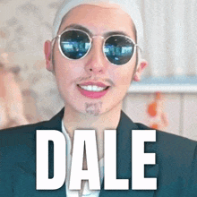 a man wearing sunglasses and a suit has the word dale on the bottom