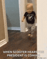 a baby is running through a hallway in a house .