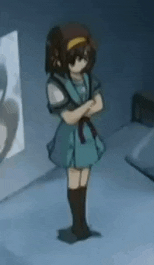 a girl in a blue dress is standing in front of a mirror in a dark room .
