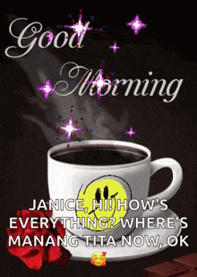 a cup of coffee with a smiley face on it and the words good morning