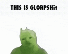 a green cat is laying on its back with the words `` this is glorpshit '' .