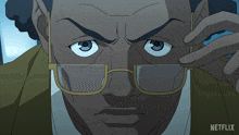 a close up of a man wearing glasses with netflix written on the bottom right