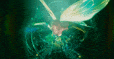 a fairy with glowing wings is surrounded by a green and blue background