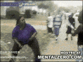 a gif of a woman dancing with the words hosted at mentalzero.com