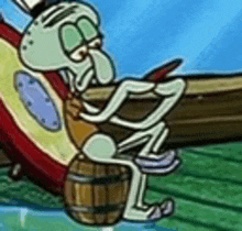 squidward from spongebob squarepants is sitting on a barrel and looking at his phone .