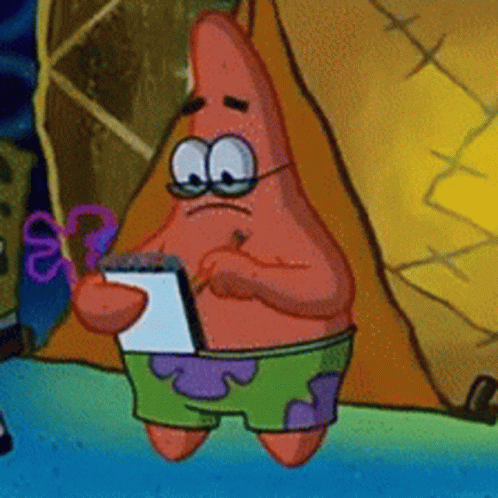 Patrick Star writing on a notepad with glasses