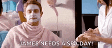 a man with a white mask on his face is sitting in a pink towel in a spa .