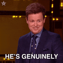 a man in a suit and tie says upset in front of a yellow background
