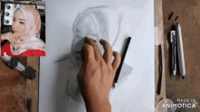 a drawing of a woman 's face is being made in animatica
