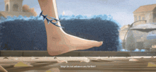 a person 's foot with spikes on it and the words stop do not advance any further on the bottom