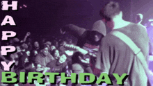 a happy birthday greeting card with a group of people in the background