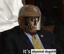 a man in a suit and tie with a picture of a man on his face and the words it 's abysmal dogshit
