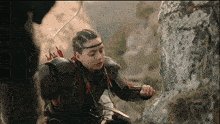 a girl with a bow and arrow on her back