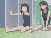 two anime girls in black swimsuits are sitting on the ground