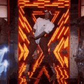 a drag queen is dancing in front of a neon sign .