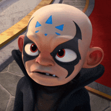 a cartoon character with a bald head and blue triangles painted on his forehead