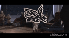 a drawing of a griffin with wings is displayed on a clipeo.com screen