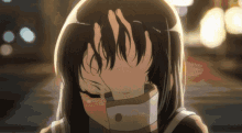 a girl with long hair is covering her face with her hand