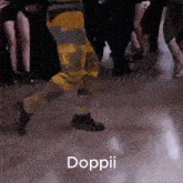 a group of people are dancing and the word doppii is on the bottom of the image
