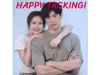 a man and a woman are posing for a picture with the words happy tasking above them