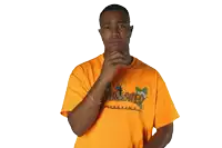 a man wearing an orange shirt that says thrasher