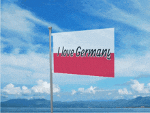 a flag that says i love germany is waving in the wind