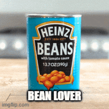a can of heinz beans with tomato sauce is on a table