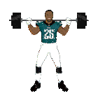 a football player with the number 26 on his jersey is lifting a barbell over his head