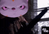 a purple stuffed animal with pink eyes and a so mo logo